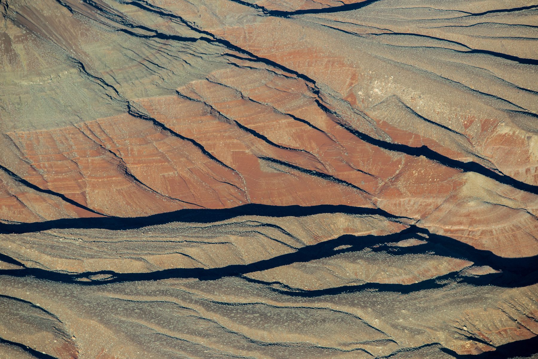 An abstract of banded sandstone, the strata drawn in fine parallel lines