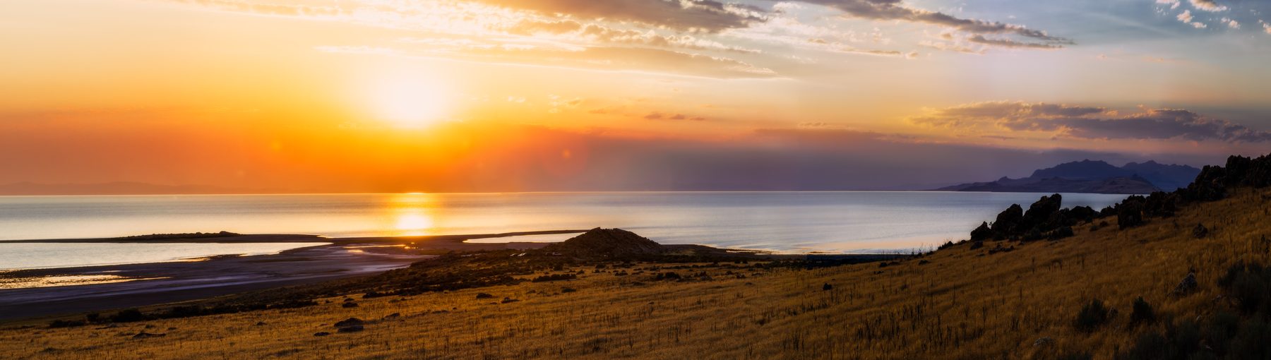 The sun setting over the Great Salt Lake from the shore of Antelope Island